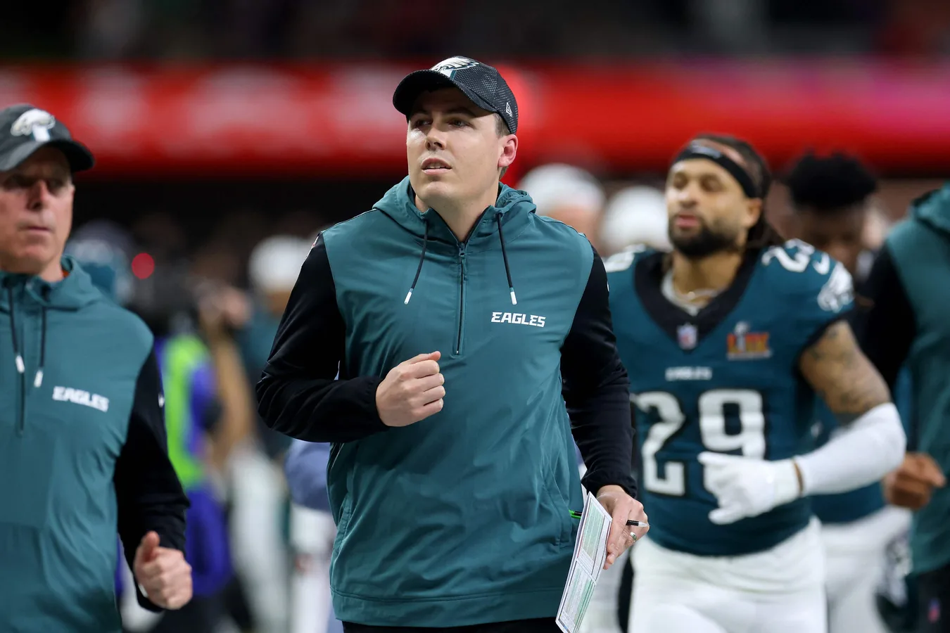 Kellen Moore in New Orleans Saints attire announcing his new head coach role following Super Bowl LIX victory